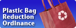 Plastic Bag Reduction Ordinance - red reusable shopping bag